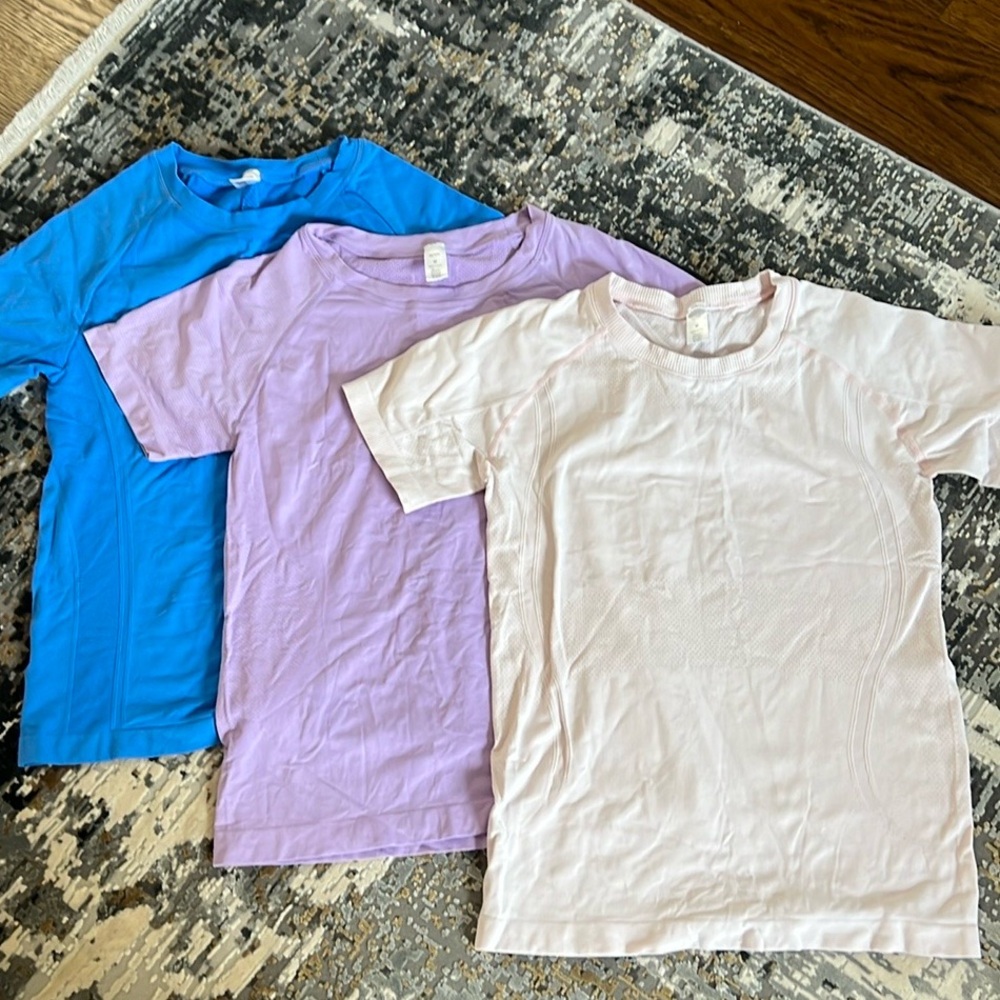 Amazon t shirt , fitted , there is a blue purple and light pink